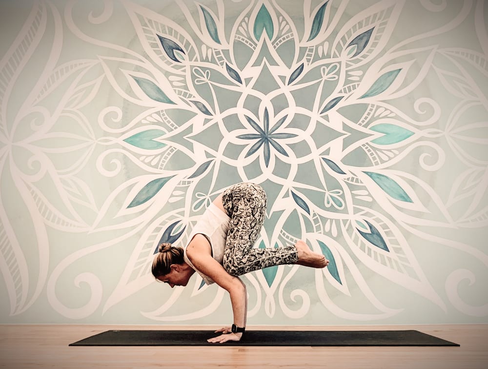 Woman practising yoga.